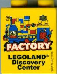 Lego Duplo, Brick 1 x 2 x 2 with LEGOLAND Discovery Center Factory 2012 Pattern 2 / Yellow