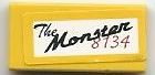 Lego Tile 1 x 2 with 'The Monster 8134' Pattern (Sticker) - Set 8134 / Yellow