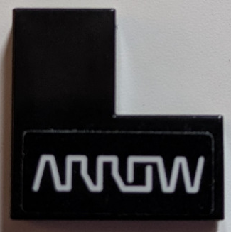 Lego Tile 2 x 2 Corner with White 'ARROW' Logo Pattern Model Left Side (Sticker) - Set 76919 / Black