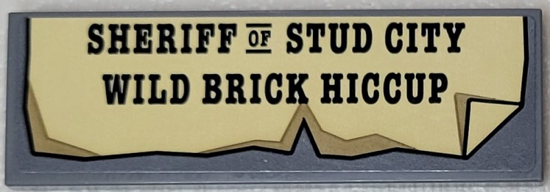 Lego Tile 2 x 6 with 'SHERIFF OF STUD CITY WILD BRICK HICCUP' on Tan Paper with Folded Corner Pattern (Sticker) - Set 910016