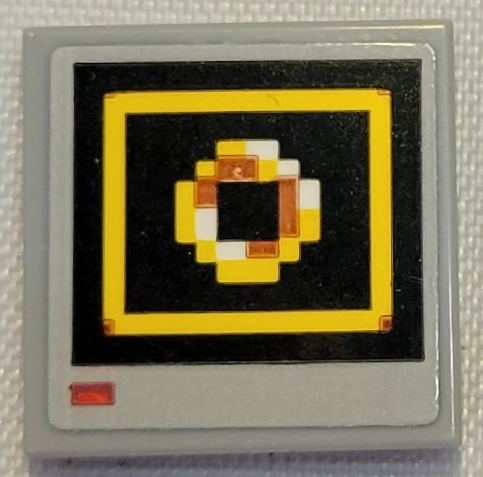 Lego Tile 2 x 2 with Pixelated Circle in Yellow Square on Black Background Pattern (Sticker) - Set 21331 (Sonic the Hedgehog Super Ring Video Monitor)