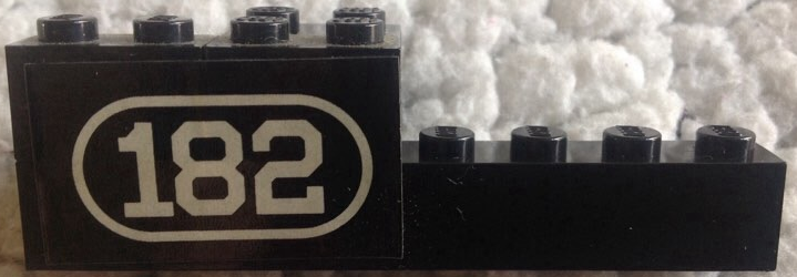 Lego Stickered Assembly 8 x 2 x 2 with White Number 182 with Border on Black Background Pattern Model Left Side (Sticker) - Set 182