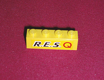 Lego Brick 1 x 4 with Black 'R.E.S.' and Red 'Q' on Yellow Background Pattern (Sticker) - Set 6479 / Yellow