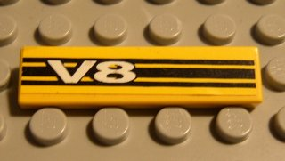Lego Tile 1 x 4 with 'V8' and Black Stripes Pattern (Sticker) - Set 8880 / Yellow