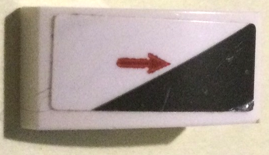 Lego Slope, Curved 2 x 1 x 2/3 with Black Triangle and Red Arrow Pattern Model Right Side (Sticker) - Set 75872