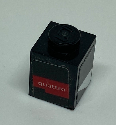 Lego Brick 1 x 1 with 'quattro' and White Trapezoid on Adjacent Sides Pattern Model Right Side (Stickers) - Set 75872