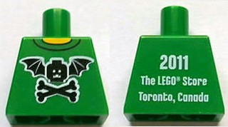 Lego Torso Black Bat Minifigure Head with Wings and Crossbones, Yellow Neck, '2011 The LEGO Store Toronto, Canada' on Back Pattern / Green