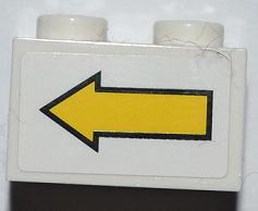 Lego Brick 1 x 2 with Yellow Left Arrow and Black Border Pattern (Sticker) - Set 8186