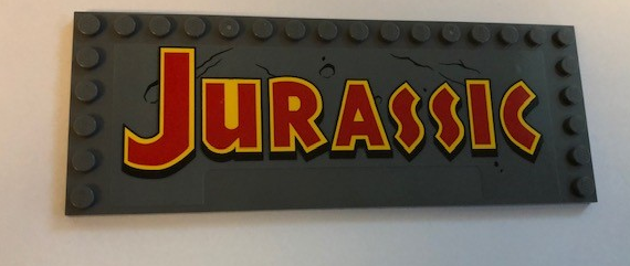 Lego Tile, Modified 6 x 16 with Studs on Edges with 'JURASSIC' Pattern (Sticker) - Set 75936