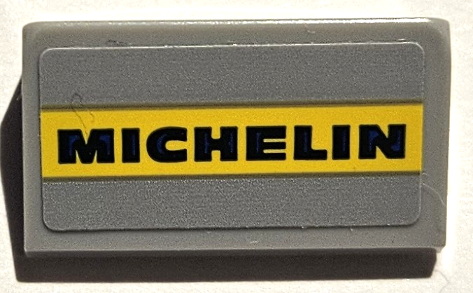 Lego Slope 30 1 x 2 x 2/3 with 'MICHELIN' on Yellow Stripe Pattern (Sticker) - Set 75889 / Light Bluish Gray
