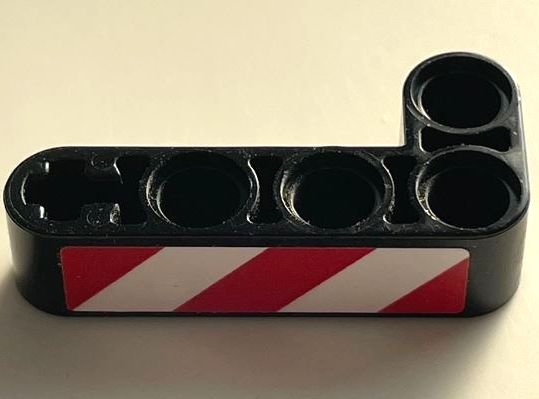 Lego Technic, Liftarm, Modified Bent Thick L-Shape 2 x 4 with Red and White Danger Stripes Pattern Model Right Side (Sticker) - Set 42061 / Black