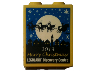 Lego Duplo, Brick 1 x 2 x 2 with LEGOLAND Discovery Centre, '2013 Merry Christmas!', Moon, Snowflakes, Skyline, and Santa's Sleigh with Reindeer Pattern