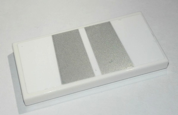 Lego Tile 2 x 4 with 2 Silver Trapezoids Pattern (Sticker) - Set 76900 / White