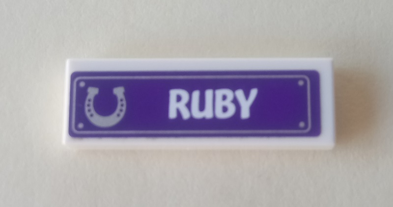 Lego Tile 1 x 3 with Horseshoe and 'RUBY' on Dark Purple Background Pattern (Sticker) - Set 41057 / White