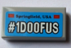 Lego Tile 1 x 2 with 'Springfield, USA' and White '#1D00FUS' Pattern (Sticker) - Set 71016 / Light Bluish Gray