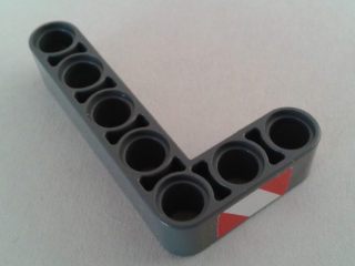 Lego Technic, Liftarm, Modified Bent Thick L-Shape 3 x 5 with Red and White Danger Stripes Pattern Model Left Side (Sticker) - Set 8053 / Dark Bluish Gray