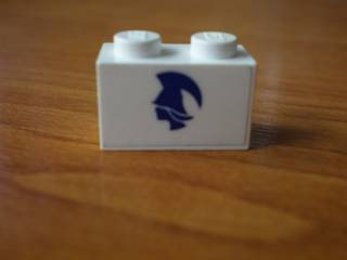 Lego Brick 1 x 2 with Blue Britannia Logo Pattern Model Left Side (Sticker) - Set 1599