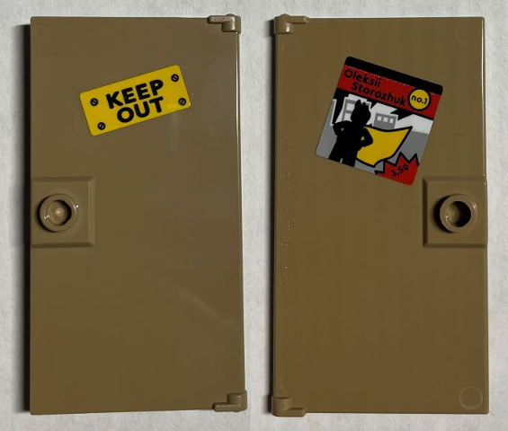 Lego Door 1 x 4 x 6 with Stud Handle with 'KEEP OUT' Sign and Poster with Silhouette, Yellow Cape and 'Oleksii Storozhuk' on Back Pattern (Sticker) - Set 21330 / Dark Tan