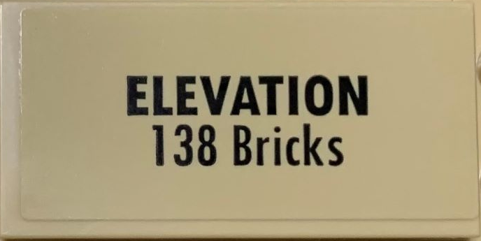 Lego Tile 2 x 4 with Black 'ELEVATION 138 Bricks' on Tan Background Pattern (Sticker) - Set 71044
