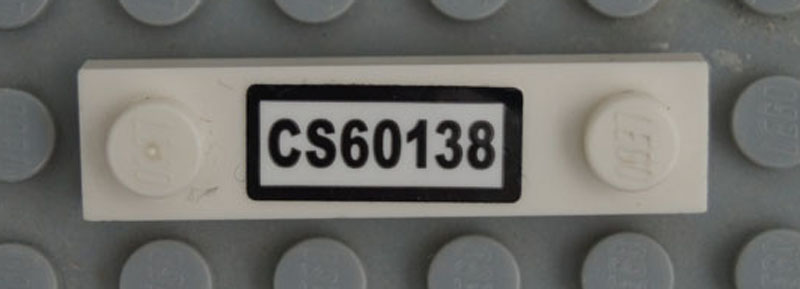 Lego Plate, Modified 1 x 4 with 2 Studs without Groove with 'CS60138' Pattern (Sticker) - Set 60138 / White