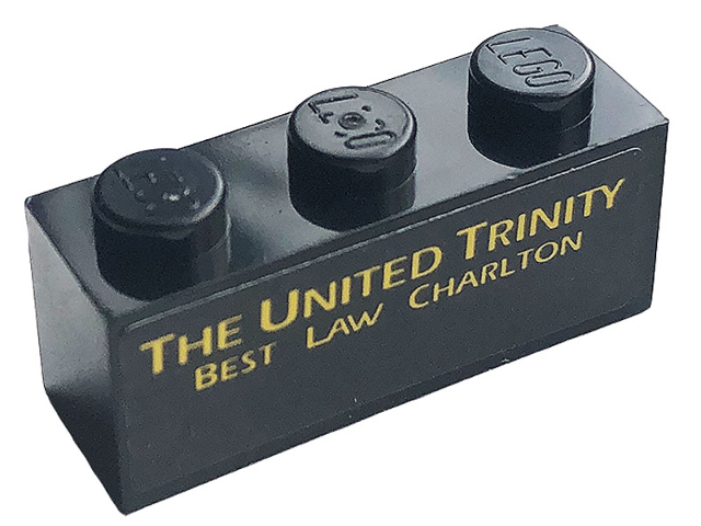 Lego Brick 1 x 3 with Yellow 'THE UNITED TRINITY BEST LAW CHARLTON' Pattern (Sticker) - Set 10272 / Black