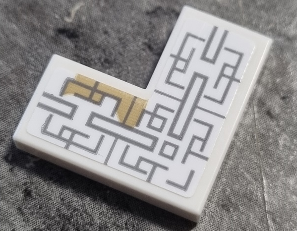 Lego Tile 2 x 2 Corner with Light Bluish Gray Asian Geometric Design with Dark Tan Stain Pattern (Sticker) - Set 76185 / White