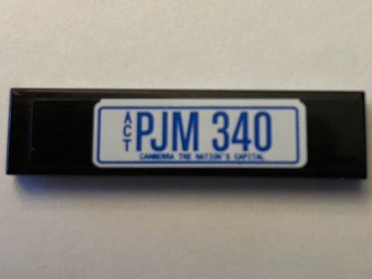 Lego Tile 1 x 4 with 'PJM 340' on Black Background Pattern (Sticker) - Set 10242