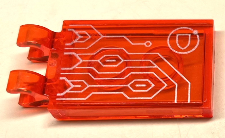 Lego Tile, Modified 2 x 3 with 2 Open O Clips with Silver Circuitry and Shield in Circle Pattern Model Left Side (Sticker) - Set 72001