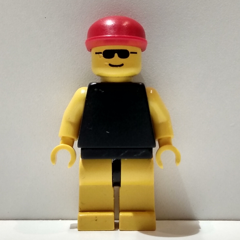 Lego Man - Black Shirt, Yellow Legs, Red Cap