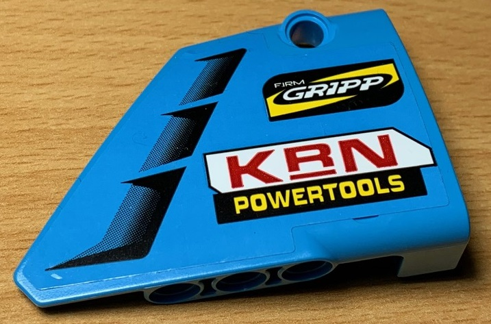 Lego Technic, Panel Fairing #14 Large Short Smooth, Side B with 'KRN POWERTOOLS' Red and Yellow and Vents Pattern (Sticker) - Set 42077 / Dark Azure