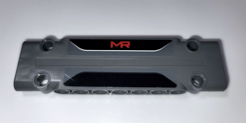 Lego Technic, Panel Plate 3 x 11 x 1 with Red 'MR' on Black Background Pattern (Stickers) - Set 42069
