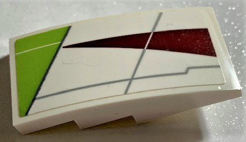 Lego Slope, Curved 4 x 2 with SW Lime Triangle and Dark Red Triangle Pattern Model Left Side (Sticker) - Set 75191