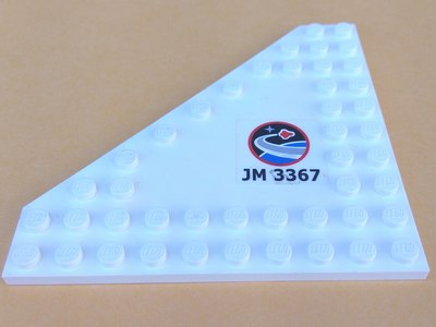 Lego Wedge, Plate 10 x 10 Cut Corner with no Studs in Center with Space Center Logo and 'JM 3367' Pattern Model Left Side (Sticker) - Set 3367 / White