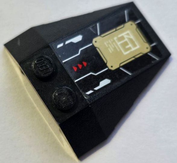Lego Wedge 4 x 4 Triple with Stud Notches with Red Triangles and Gold Armor Plate with Ninjago Logogram Letter C Pattern Model Left Side (Sticker) - Set 71765 / Black