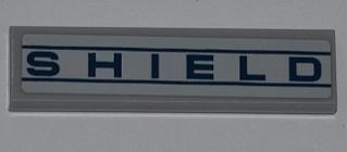 Lego Tile 1 x 4 with 'SHIELD' Pattern (Sticker) - Set 6867