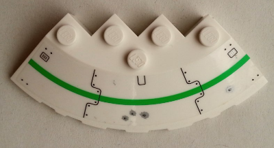 Lego Brick, Round Corner 6 x 6 with Slope 33 Edge, Facet Cutout with Bright Green Stripe, Vent Grilles and Bullet Holes Pattern Model Left Side (Sticker) - Set 70704 / White