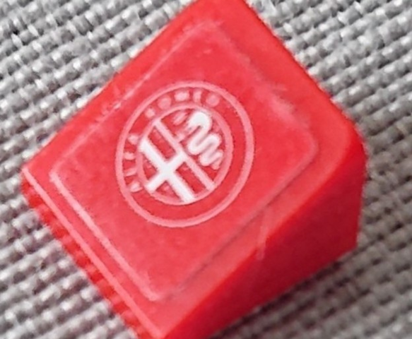 Lego Slope 30 1 x 1 x 2/3 with White Alfa Romeo Logo on Red Background Pattern Model Right Side (Sticker) - Set 75879